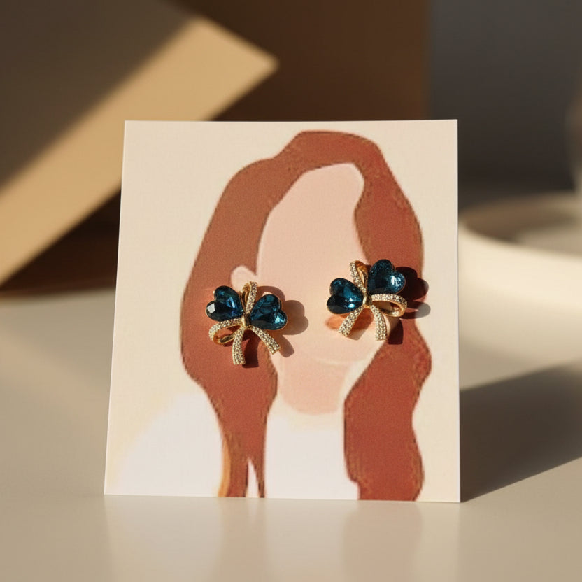 Blue Sapphire Heart Bow Stud